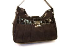 Overlap square print jacquard fashion handbag with patent leather patchwork, shoulder strap & top zipper closure. Imported.