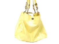 Designer Inspired Tote Shoulder Bag with a snap closure and a detachable double handle. Bag has a metallic texture. Made of PU (polyurethane).