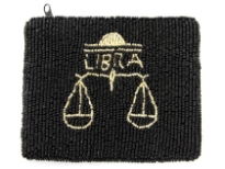 Hand Beaded coin purse. Top zipper closing.