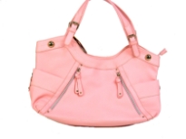 Designer Inspired Shoulder Bag with a round top, side open pockets and zipper details in the front. Top zipper closure and a double shoulder handles. Made of PU (polyurethane).