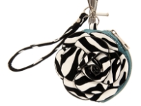 PVC Flower Wrist-let with animal print Floral applique in front & also the handle.