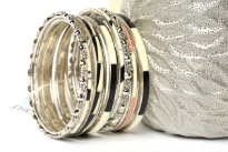 This set of 14 pieces set includes hand painted, plain & studded bangles in different widths & designs. Trendy bangles can be worn all year around with any kind of outfit.