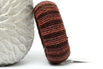 Wide Cuff Artsy Fashion Bangle Bracelet. Made of small beads. Handcrafted by expert artisans. Durable and high quality construction.