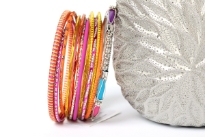 Bohemian fashion 13 piece set of bangle bracelets. Handcrafted by expert artisans in India. Durable and high quality bangle set. 