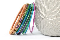 Bohemian fashion 13 piece set of bangle bracelets. Handcrafted by expert artisans in India. Durable and high quality bangle set.