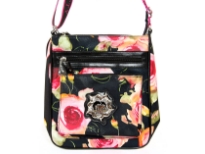 Betty Boop Printed PVC Messenger Bag made with fabric. Has zipper closure with a single adjustable strap. 