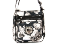 Betty Boop Printed PVC Messenger Bag made of fabric. Has zipper closure and one adjustable strap. 