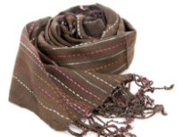 Coffee colored yarn dyed 95% viscose with 5% metallic scarf with stitching like stripes in fuchsia, orange and white. Twisted fringes on the edges. Imported. Hand wash.