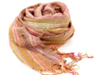 Mocha colored open weave 100% viscose scarf with tones of orange & pink. Twisted long fringes on the edges completes this pastel scarf. Imported. Hand wash.