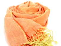 95% viscose with 5% metallic scarf in shades of orange and yellow. Thin metallic gold stripes run through it horizontally. Imported. Hand wash.