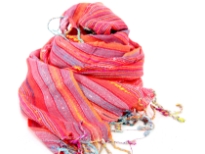 Dark coral with orange & red hues viscose scarf with twisted fringes on the edges. Multi colored woven stripes makes it more vibrant. Yarn dyed 100% viscose material. Hand wash. Imported.