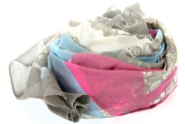 Mocha colored pearls, rings & bows print spread over beige colored artistic background. Little blue & pink adds color to this lightweight scarf which can be used all year around. Eyelash fringe along the vertical length of Mocha bordered 100% polyester scarf. Imported.