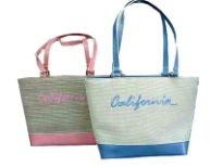 Fashionable California bag has a double shoulder straps and a top zipper closure. Made of fabric.