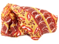 Leafy print in red & brown on this yellow colored 100% silk scarf. Bright colored scarf can enliven any kind of outfit & can be used in any possible way. Made in India.