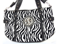 Animal Print Fleur De Liz Handbag with double shoulder handle as well as removable long shoulder strap. Top zipper closing.