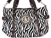 Animal Print Fleur De Liz Handbag with double shoulder handle as well as removable long shoulder strap.  Top zipper closing.