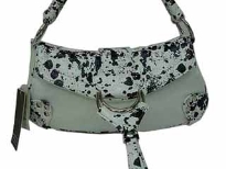 Designer Inspired handbag has animal print trimming, a single strap, zipper closure, and a flap with magnetic closure, made of faux leather.