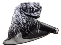 Artistic black sheer scarf with white colored print on it. 60% Polyester and 40% Silk. Hand wash.