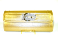 Fashion Clutch Bag has a glossy texture and a studded logo. Magnetic closure. Made of PVC.