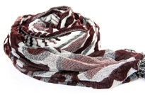 This artistically patterned 100% Polyester scarf in brown & beige colors is double layered and super soft to use. This retro scarf can be teamed with any kind of outfit. Thin fringes on the edges adds that extra zing to it. Imported.