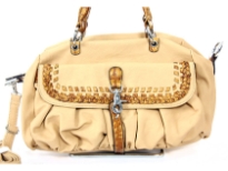 This double handle bag is made of polyurethane material. It has a top zipper closure with a lobster claw opening. Detachable shoulder strap included.