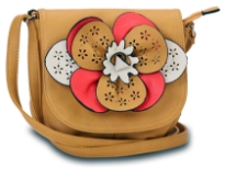 Faux leather crossbody small bag has a large floral detail with contrasting colors. Bag has an adjustable strap, top zipper closuer and front flap closure. Made of faux leather.