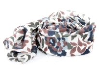 Ivory colored 100% cotton scarf with multicolored floral print on it. Imported. Hand wash.