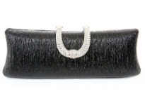 Patterned Metal Frame Evening bag with rhinestones clasp over it.