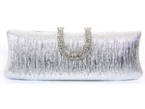 Patterned Metal Frame Evening Bag with rhinestones clasp over it.