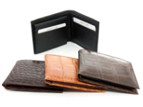 Carry your money in style. This is a Crocodile embossed genuine cow leather bifold mens wallet. The outside shell is genuine cow-hide leather and the inside is faux leather. As this is genuine leather, please be aware that there will be some small creases and nicks in the leather but the wallet are all brand new.