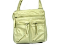Fashion bag has multiple exterior pockets with zipper closure. Single strap. Made of PVC.