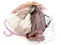 Crinkled Two Tone Woven Polyester Scarf with eyelash fringes all around it. Soft and lightweight to use & comes on a small round hanger. Imported. 100% polyester.