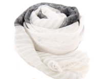 White & black colors alternate horizontally on this sheer 100% polyester scarf with stripes pattern on it. Eyelash fringe all around the scarf. Imported. Hand wash.