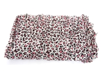 Leopard spots pattern this breezy crinkled scarf for a double dose of on-trend appeal. Two tone leopard print over solid color background. Can be used in multiple ways with any kind of outfit.