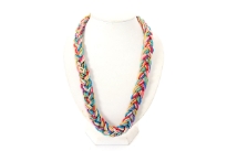Multi colored threads & metal chain are braided together to make this beautiful & colorful 2 cm wide necklace. Imported.