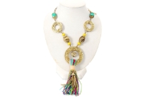 Luxurious neck piece has gold tone links chain as string with mesh design round metal accents & same bigger size pendant adorned with knotted colored threads & chains accent. Colored as well as gold tone resin beads accent also. Imported.