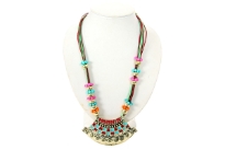 Colorful resin beads make floral pattern on two tone multi string necklace which also has broad metal pendant which is handpainted & has engraved design. Imported.