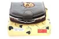 Genuine Leather Ladies wallet. The wallet comes with Gift Box.