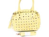 Faur Leather Metal Eyelets studded Douible Handle Bag. Top zipper closing, Adjustable shoulder strap included.